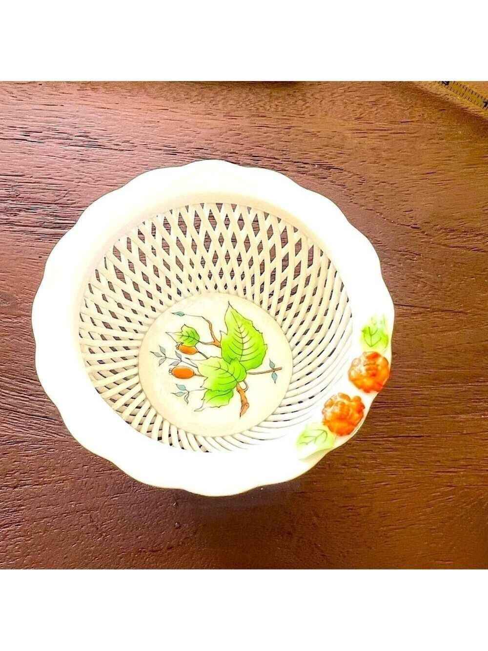 Herend 1960’s exquisite porcelain woven bowl. Hand painted flowers on base